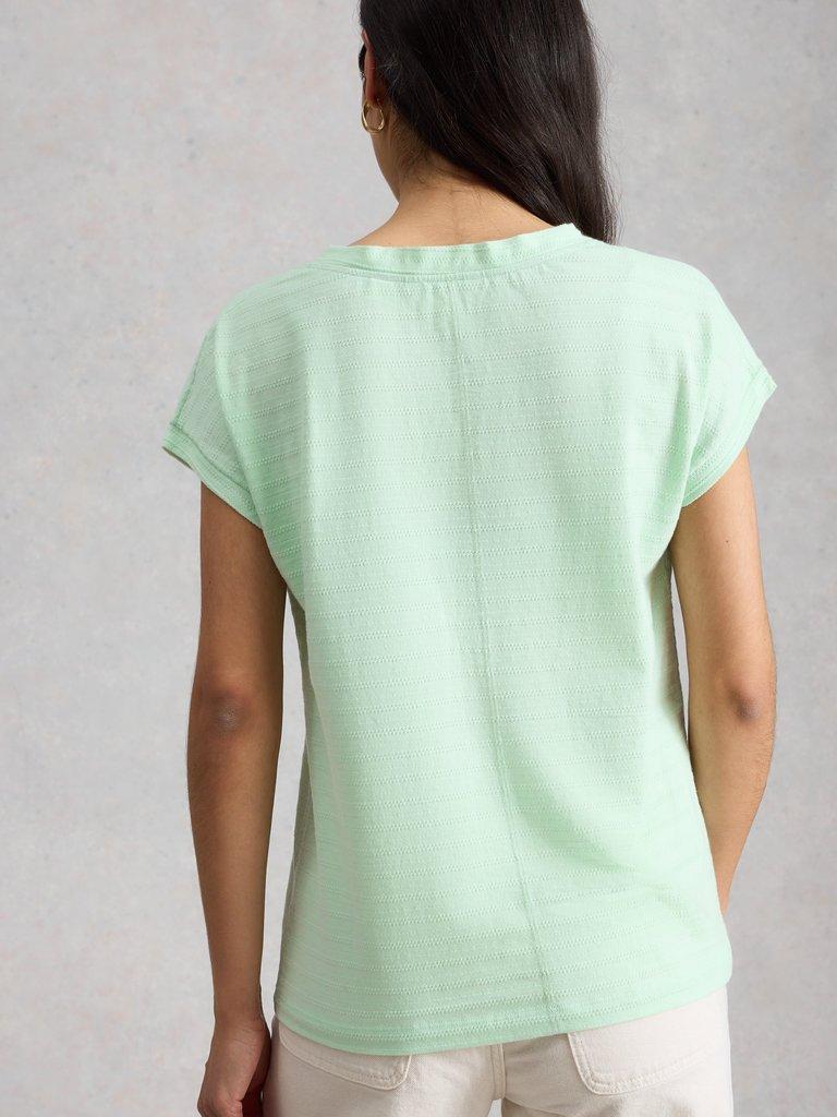 NELLY NOTCH TEXTURE T-SHIRT in LGT GREEN - MODEL BACK