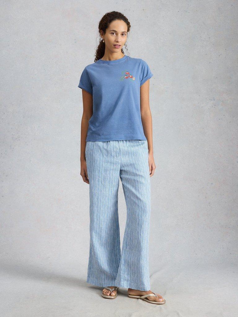 GINA GRAPHICS TEE in BLUE MLT - MODEL FRONT
