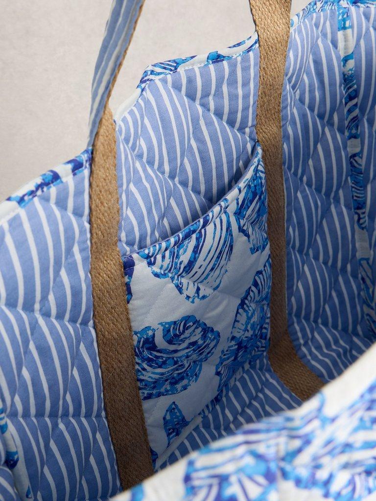 Riley Reversible Tote Bag in BLUE MLT - MODEL DETAIL