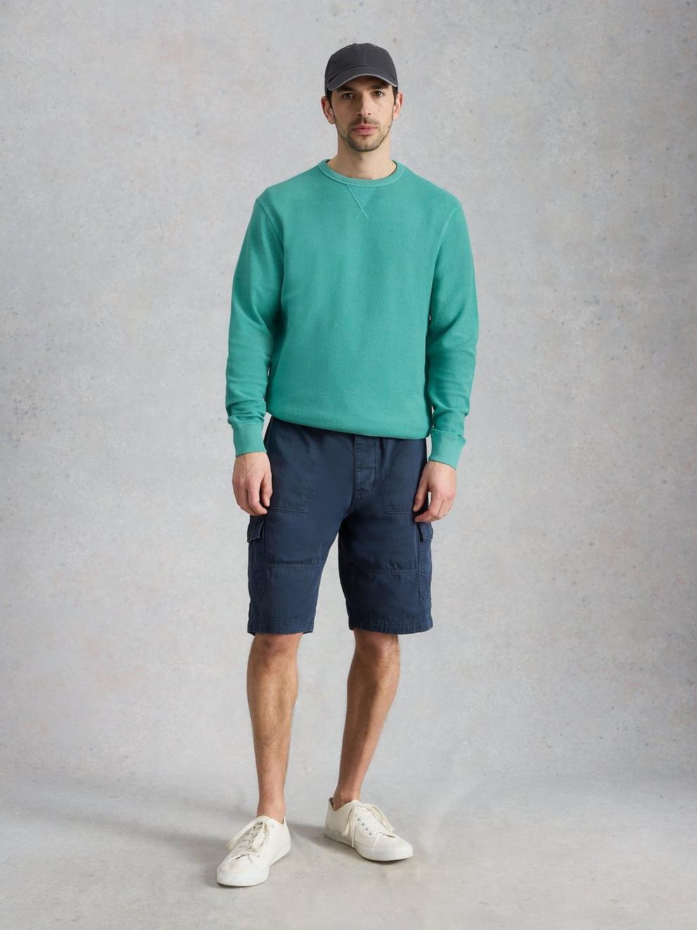 Sidmouth Crew Neck Jumper in MID GREEN - MODEL FRONT
