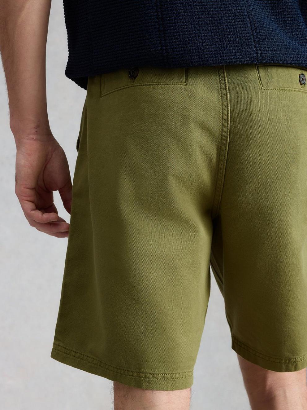 Chapman Casual Short in MID GREEN - MODEL BACK