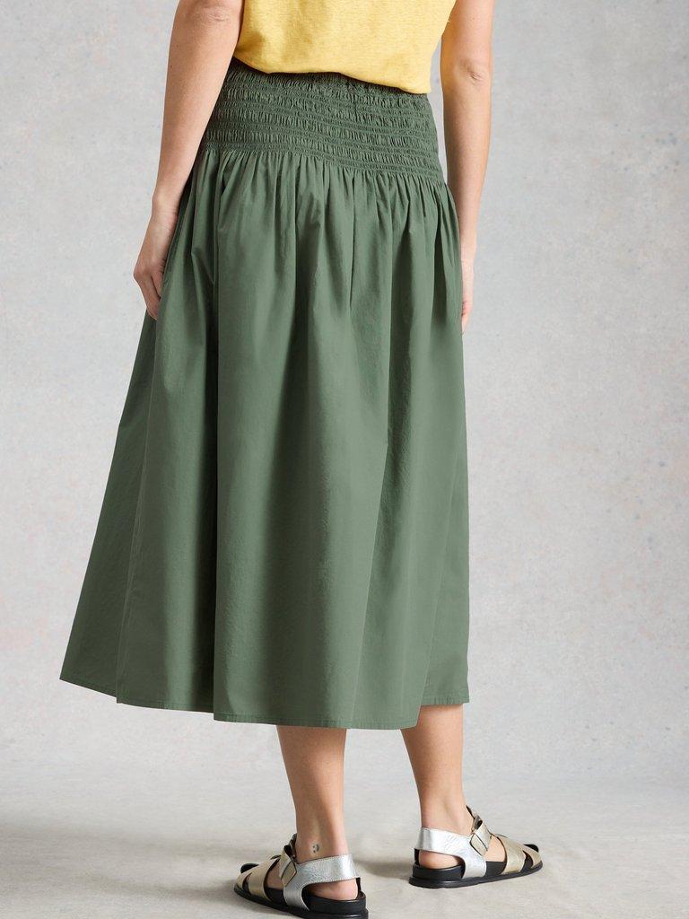 Suri Shirred Midi Skirt in MID GREEN - MODEL BACK