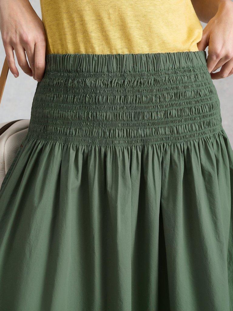 Suri Shirred Midi Skirt in MID GREEN - MODEL DETAIL