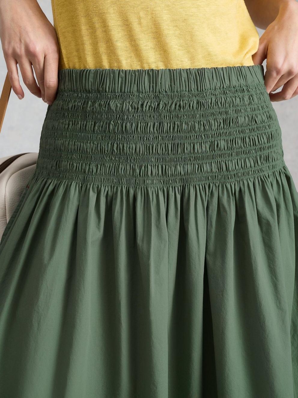 Suri Shirred Midi Skirt in MID GREEN - MODEL DETAIL