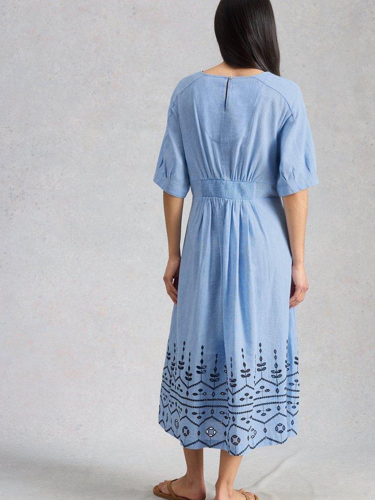 Kate Broderie Midi Dress in CHAMB BLUE - MODEL BACK