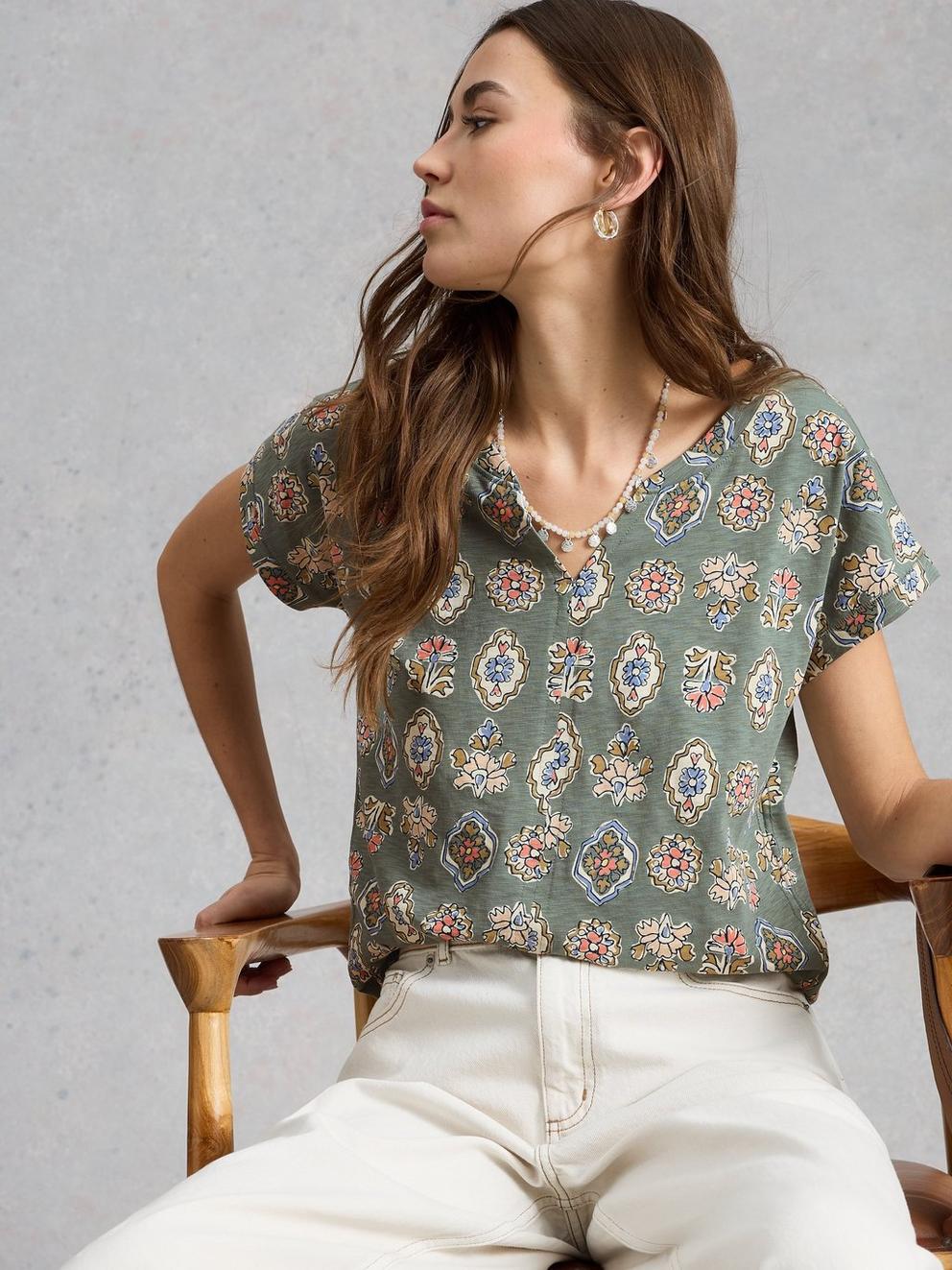 NELLY PRINT NOTCH NECK TEE in KHAKI GRN - MODEL DETAIL