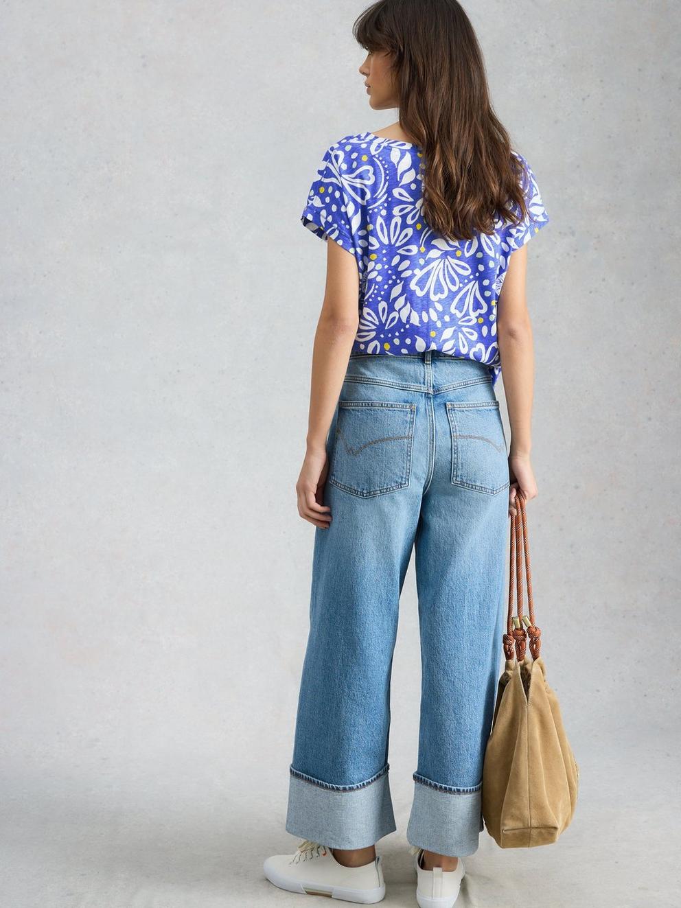 NELLY NOTCH NECK TEE in BRT BLUE - MODEL BACK