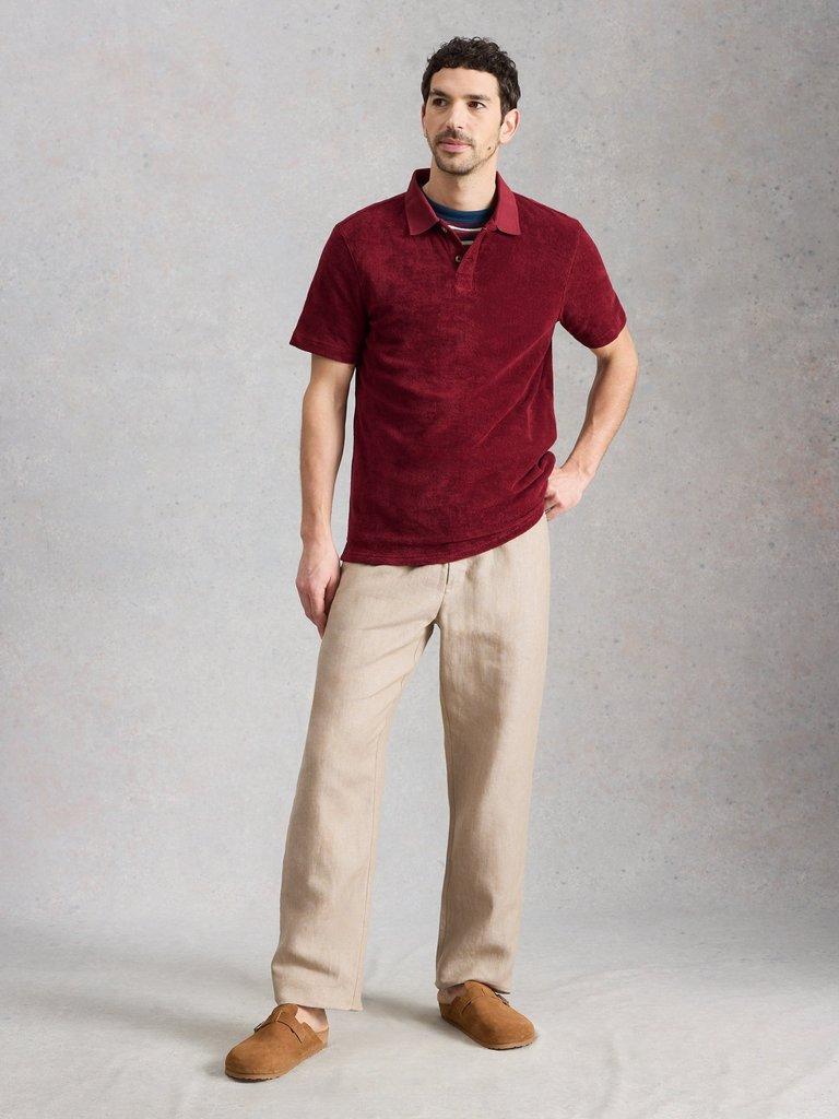 Towelling Polo in MID RED - MODEL FRONT
