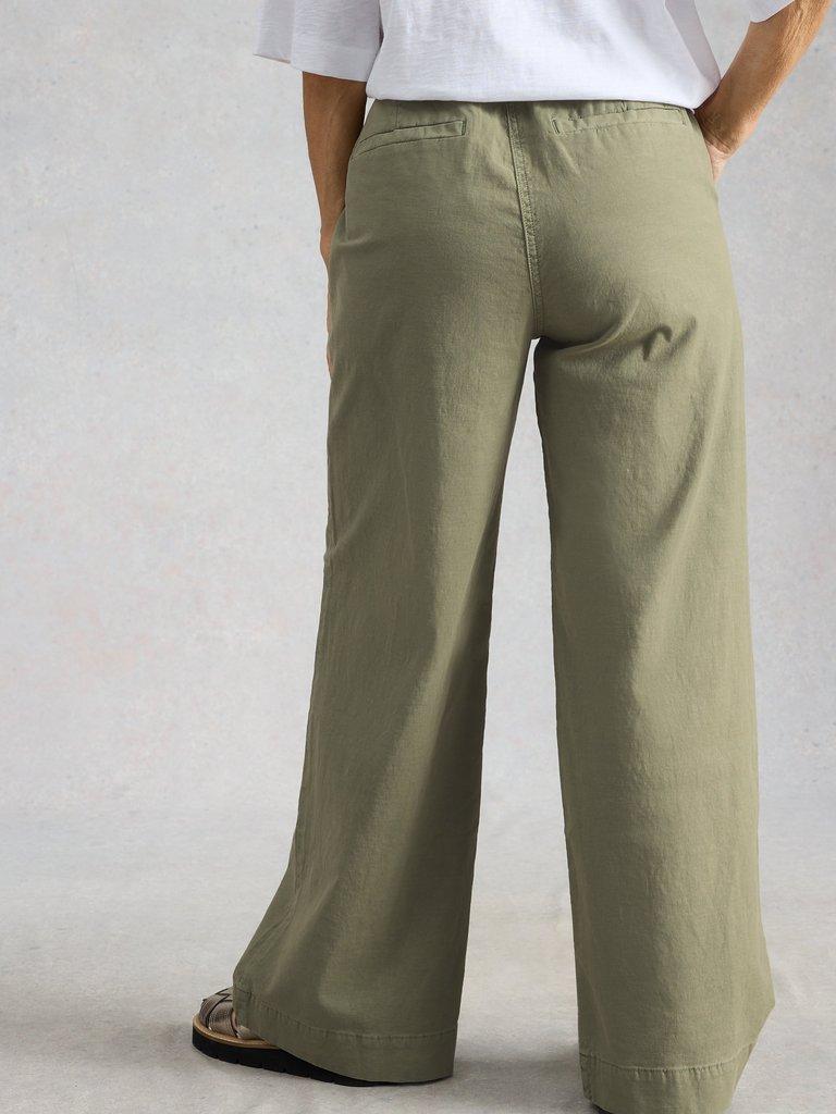 Storm Wide Leg Chino Trouser in DUS GREEN - MODEL BACK