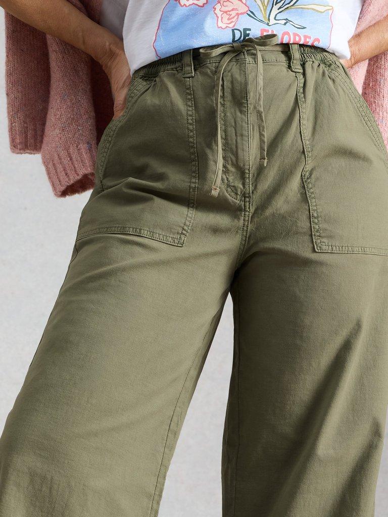Storm Wide Leg Chino Trouser in DUS GREEN - MODEL DETAIL