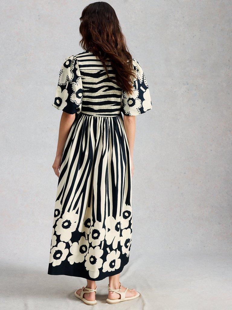 Eve Stripe Dress in NAVY MULTI - MODEL BACK