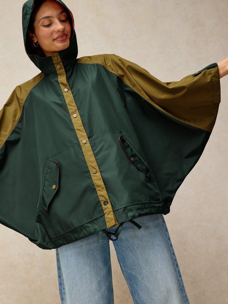 DAKOTA SHOWERPROOF PONCHO in GREEN MLT - MODEL FRONT