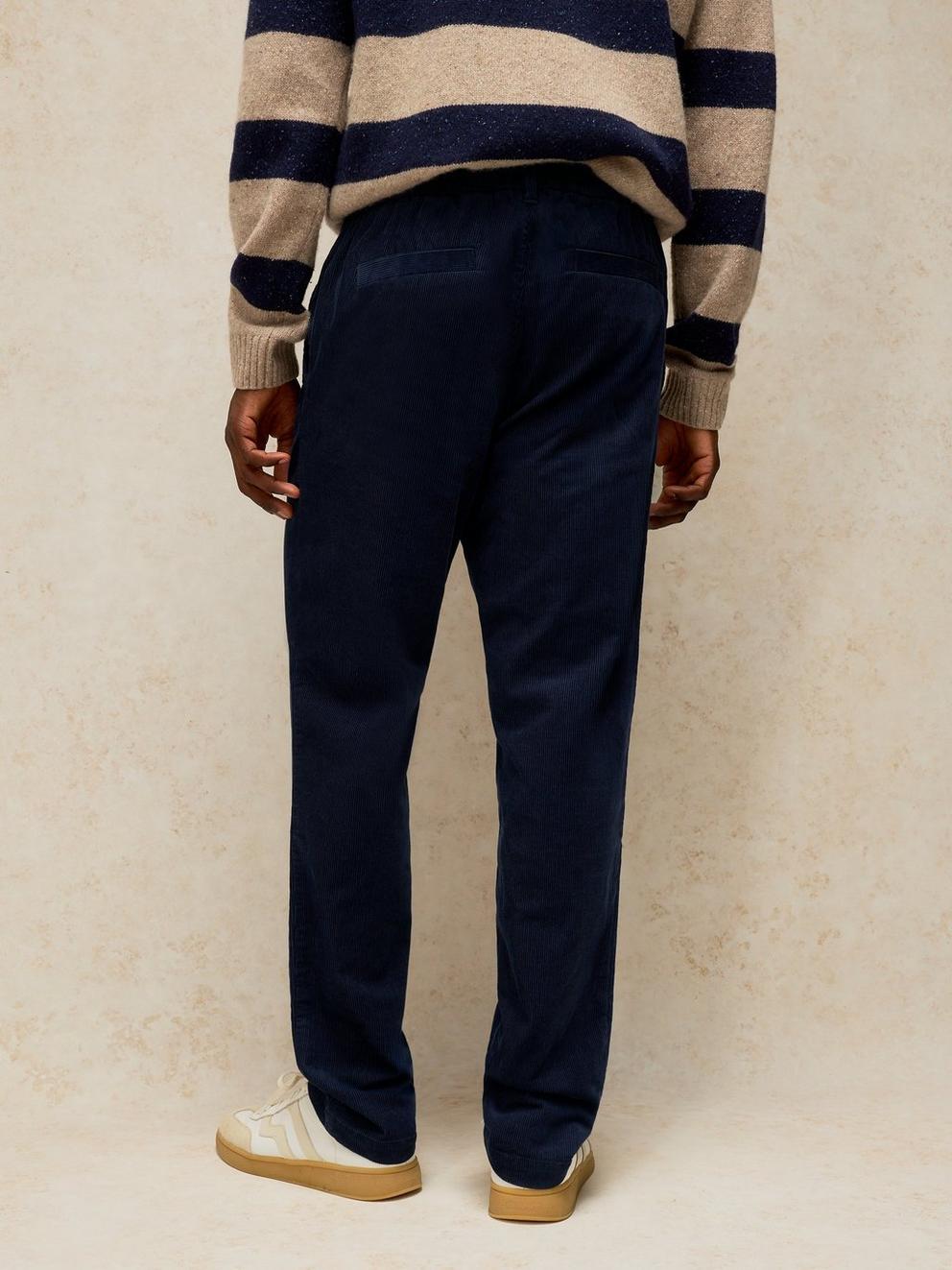 CAMBER CORD DRAWSTRING TROUSER in DARK NAVY - MODEL BACK