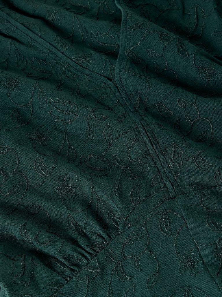 MEGAN EMBROIDERED JERSEY DRESS in DK GREEN - FLAT DETAIL