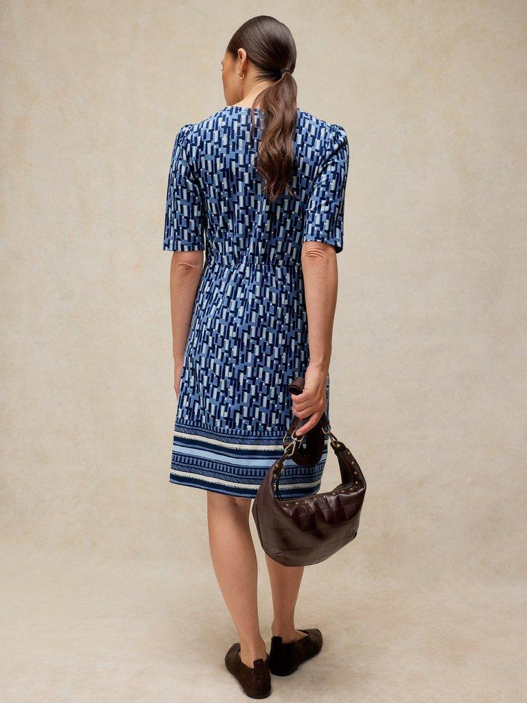 OLIVIA JERSEY DRESS in BLUE MLT - MODEL BACK