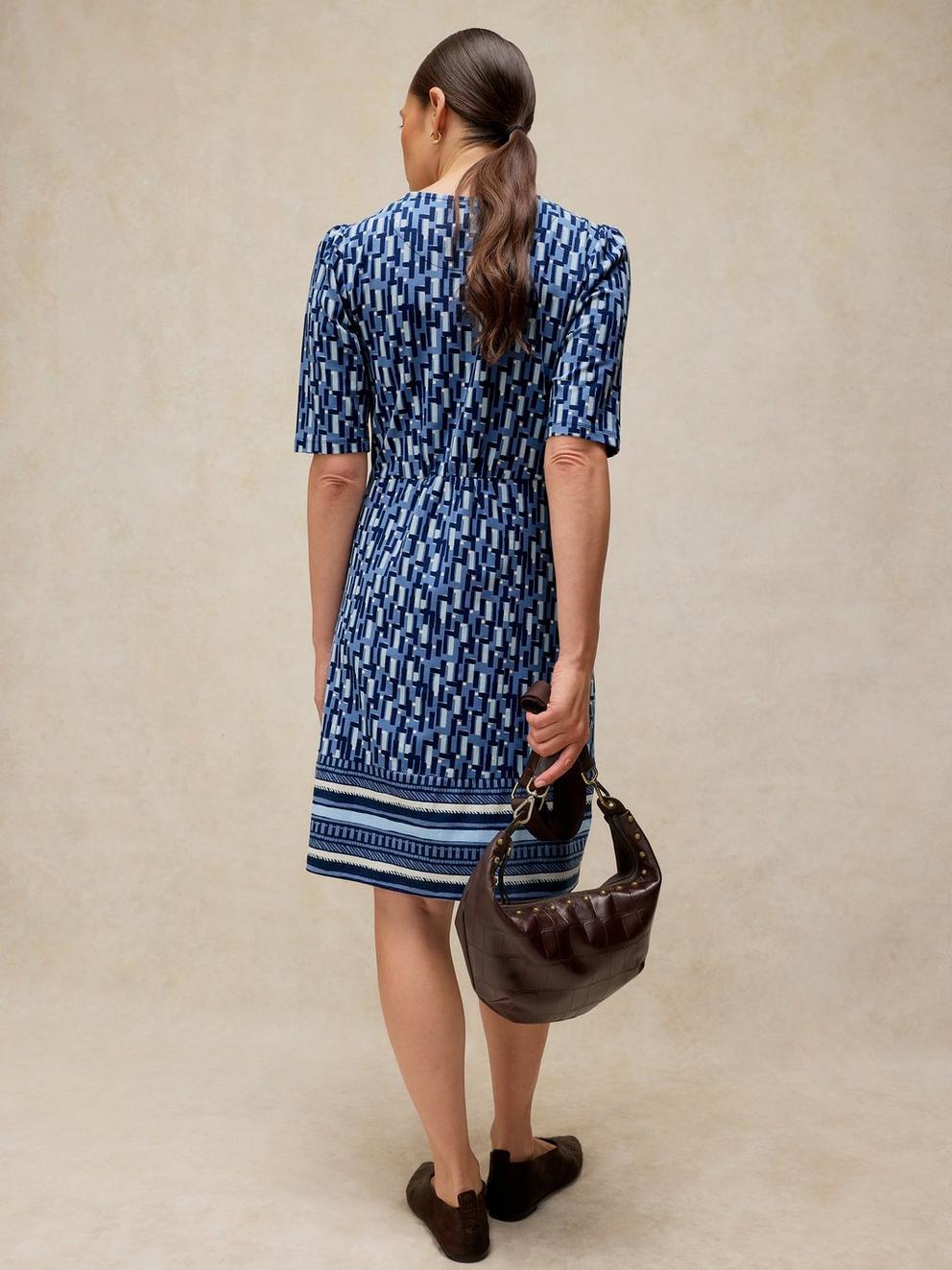 OLIVIA JERSEY DRESS in BLUE MLT - MODEL BACK