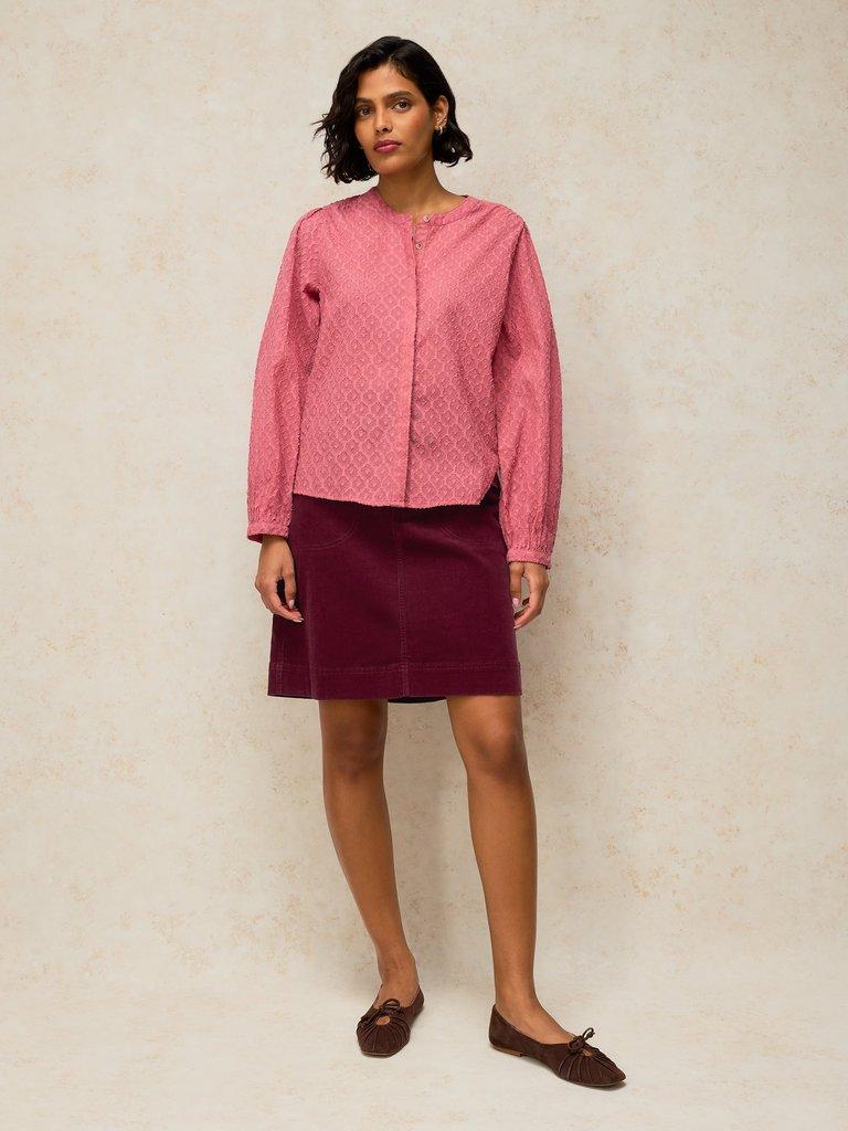 TIA CORD SKIRT in DK PLUM - MODEL FRONT