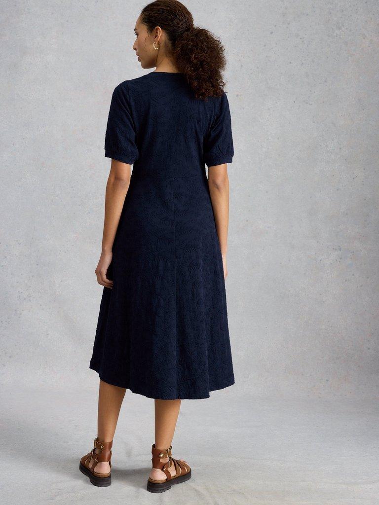 Megan Embroidered Jersey Dress in MID BLUE - MODEL BACK