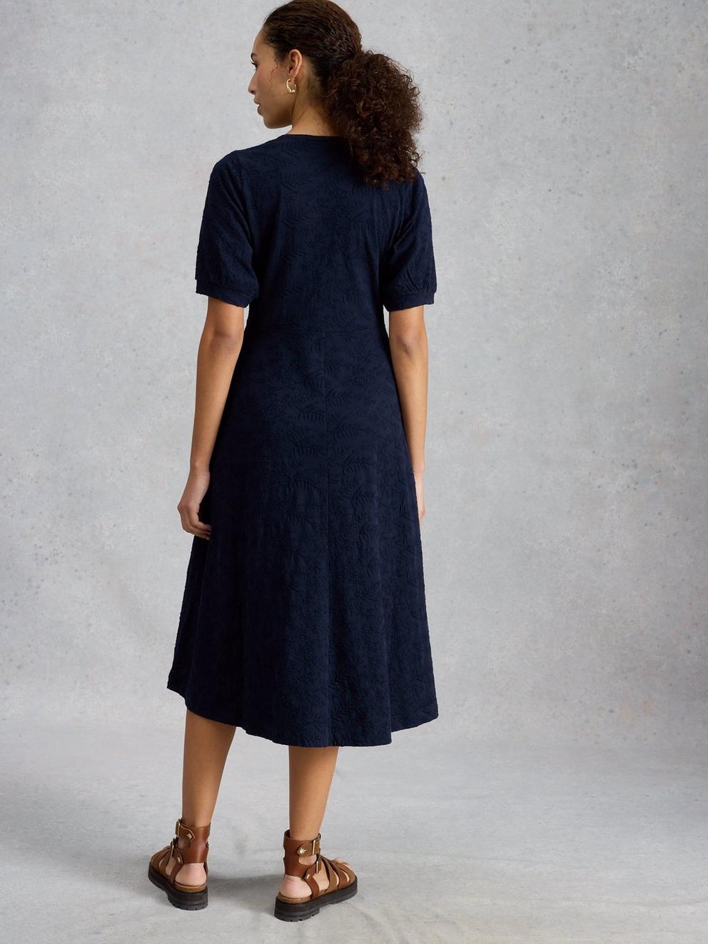 Megan Embroidered Jersey Dress in MID BLUE - MODEL BACK