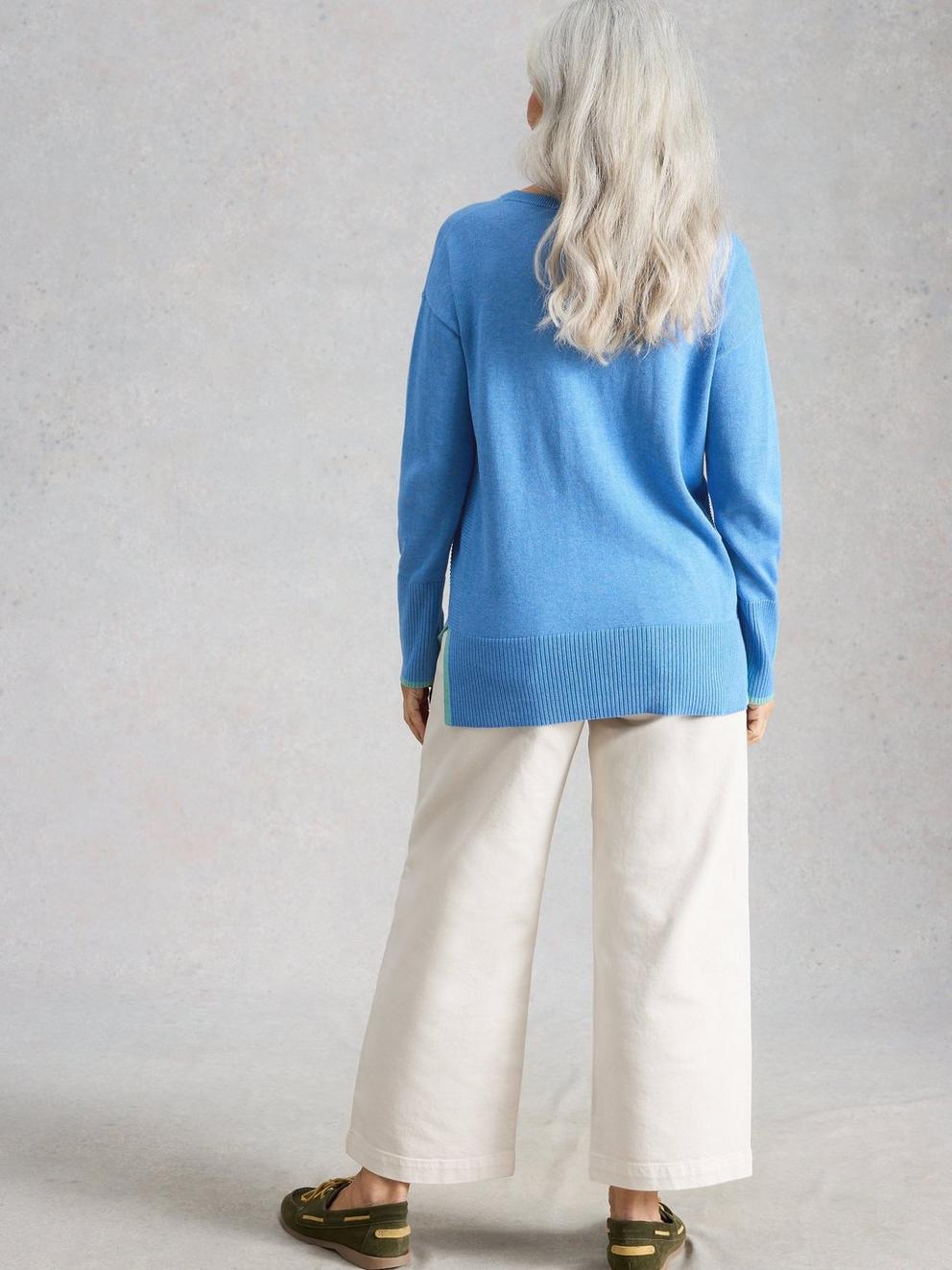 OLIVE JUMPER in MID BLUE - MODEL BACK
