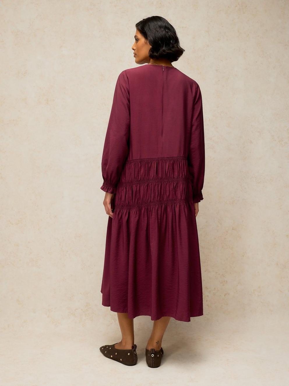 ADELINE DROP WAIST DRESS in DK PLUM - MODEL BACK