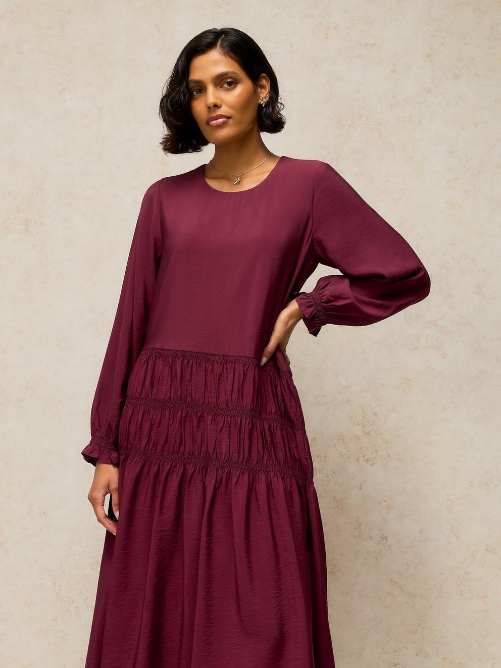 ADELINE DROP WAIST DRESS in DK PLUM - MODEL DETAIL