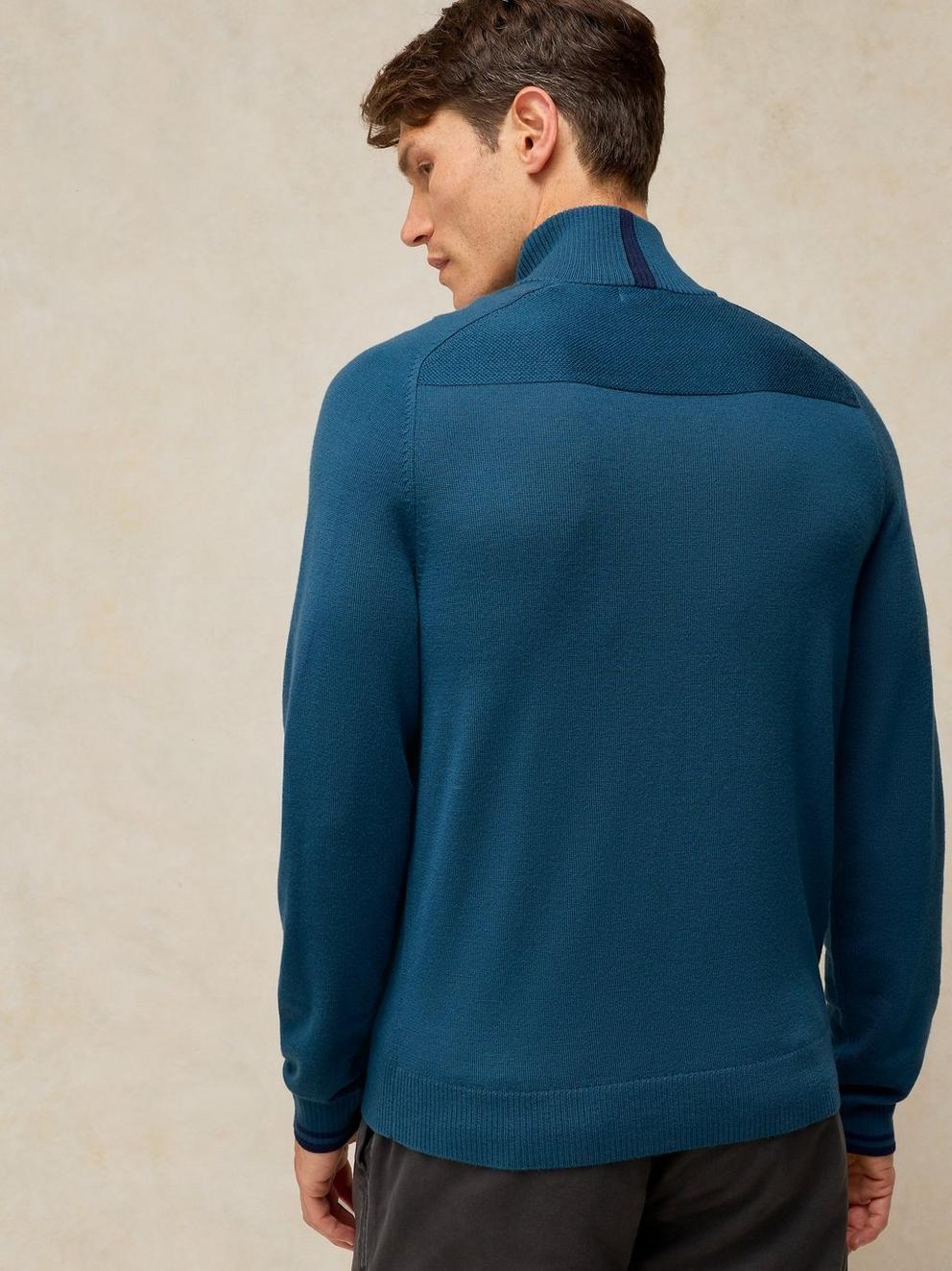 CONWAY MERINO FUNNEL JUMPER in DK TEAL - MODEL BACK