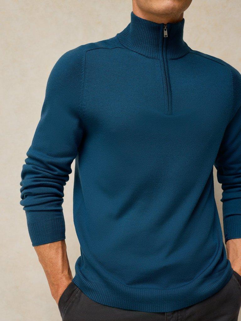CONWAY MERINO FUNNEL JUMPER in DK TEAL - MODEL DETAIL