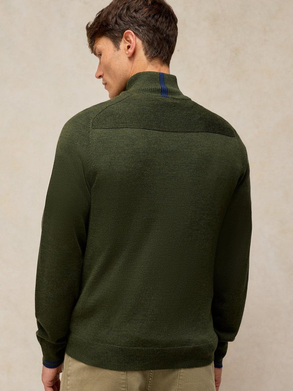 CONWAY MERINO FUNNEL JUMPER in KHAKI GRN - MODEL BACK