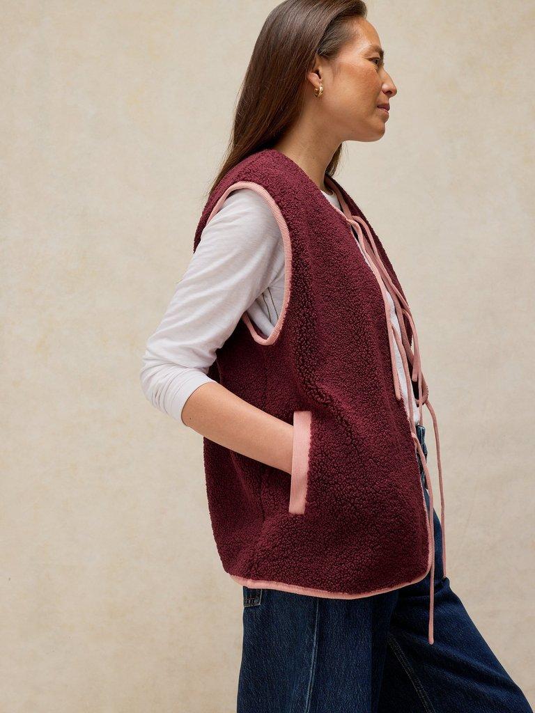 BORG TIE FRONT GILET in DK PLUM - MODEL DETAIL