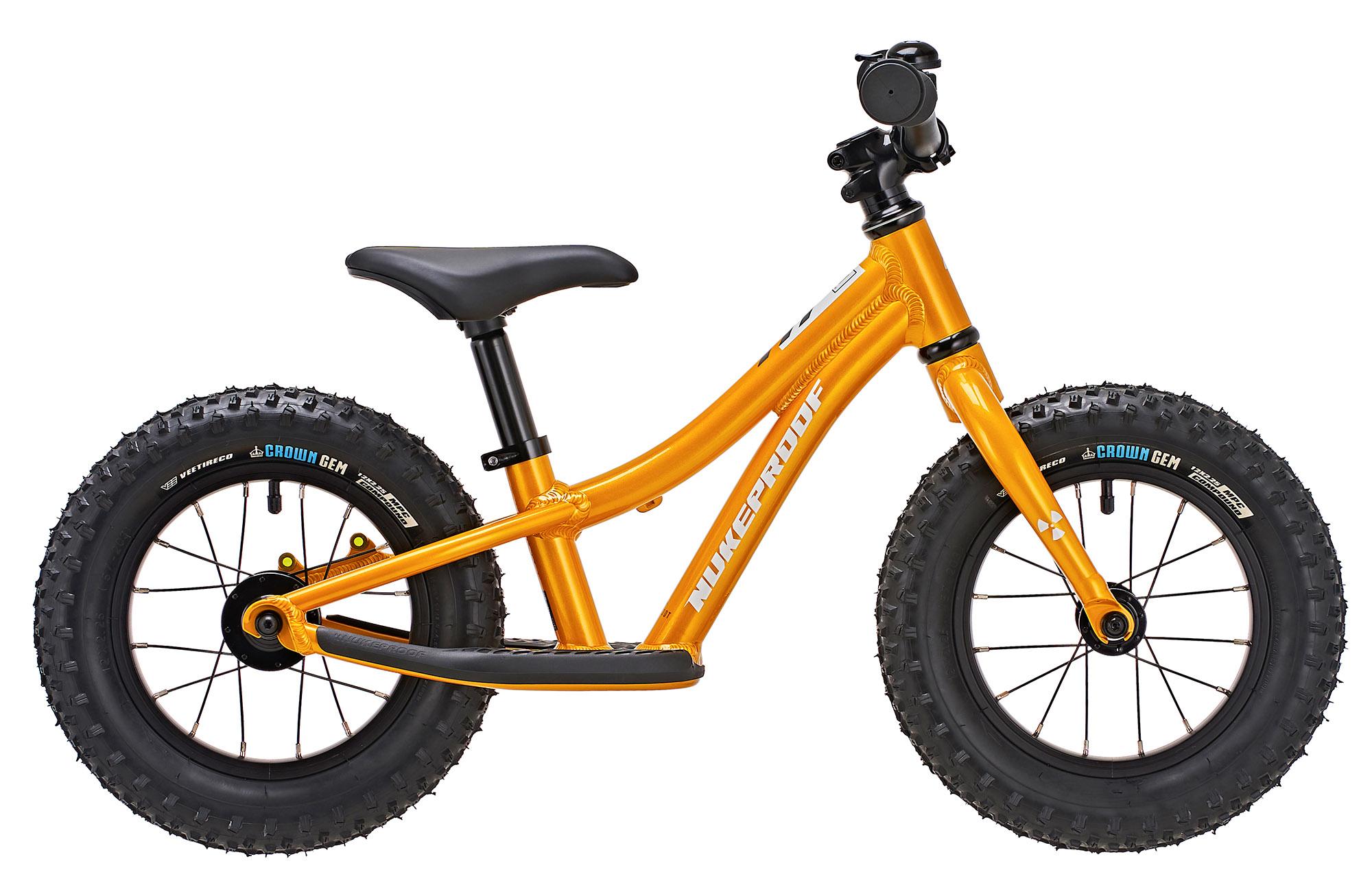 Click to view product details and reviews for Nukeproof Cub Scoot 12 Kids Mountain Bike Turmeric Yellow.