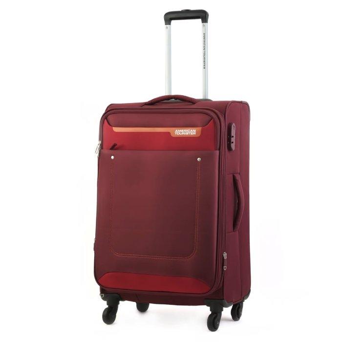 حقيبة سفر أمريكان توريستر جاكسون 57 سم (FP6X00901) احمر غامق + وسادة ذكية