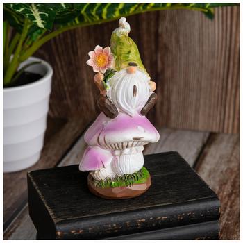 Gnome Sitting On Mushroom