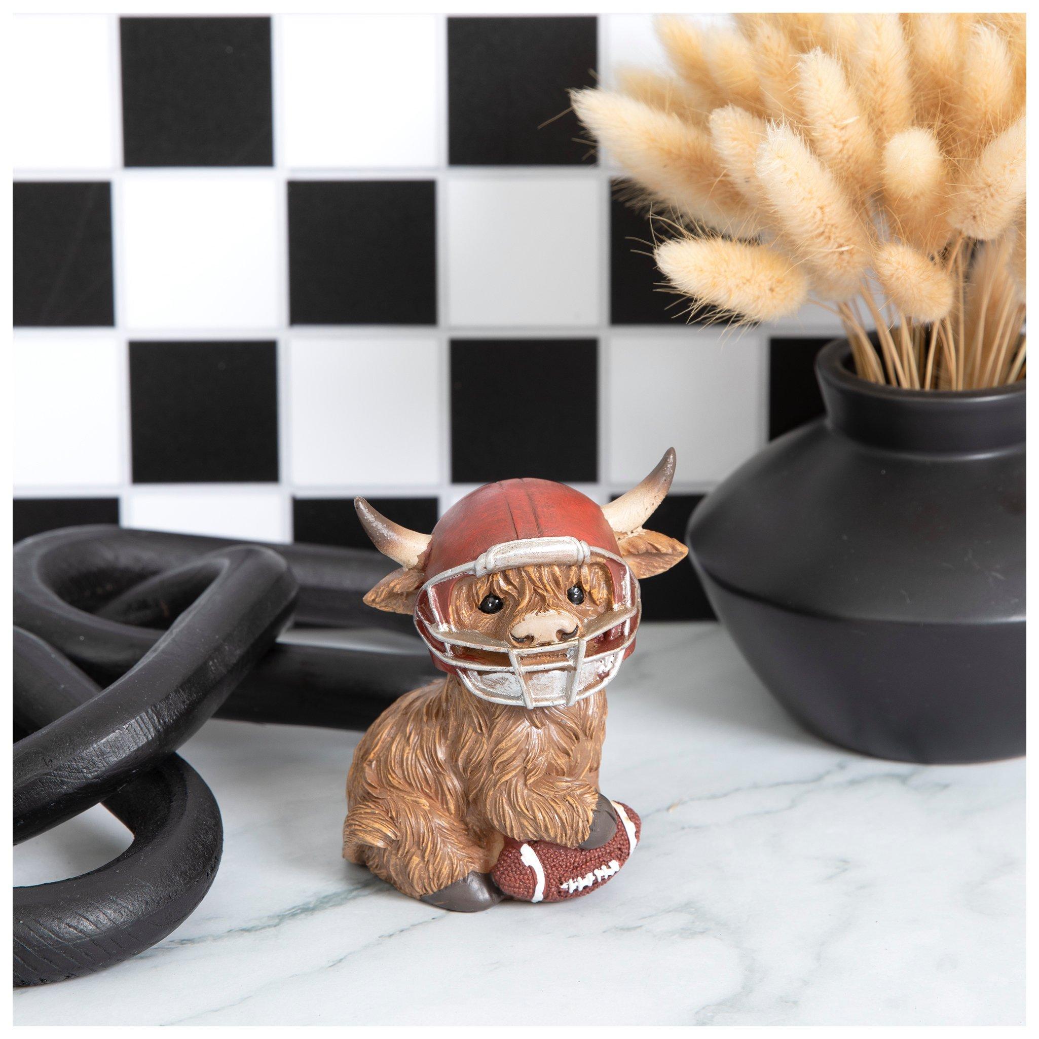 cow football helmet Highland Cow Wearing Football Helmet Figurine | Hobby Lobby