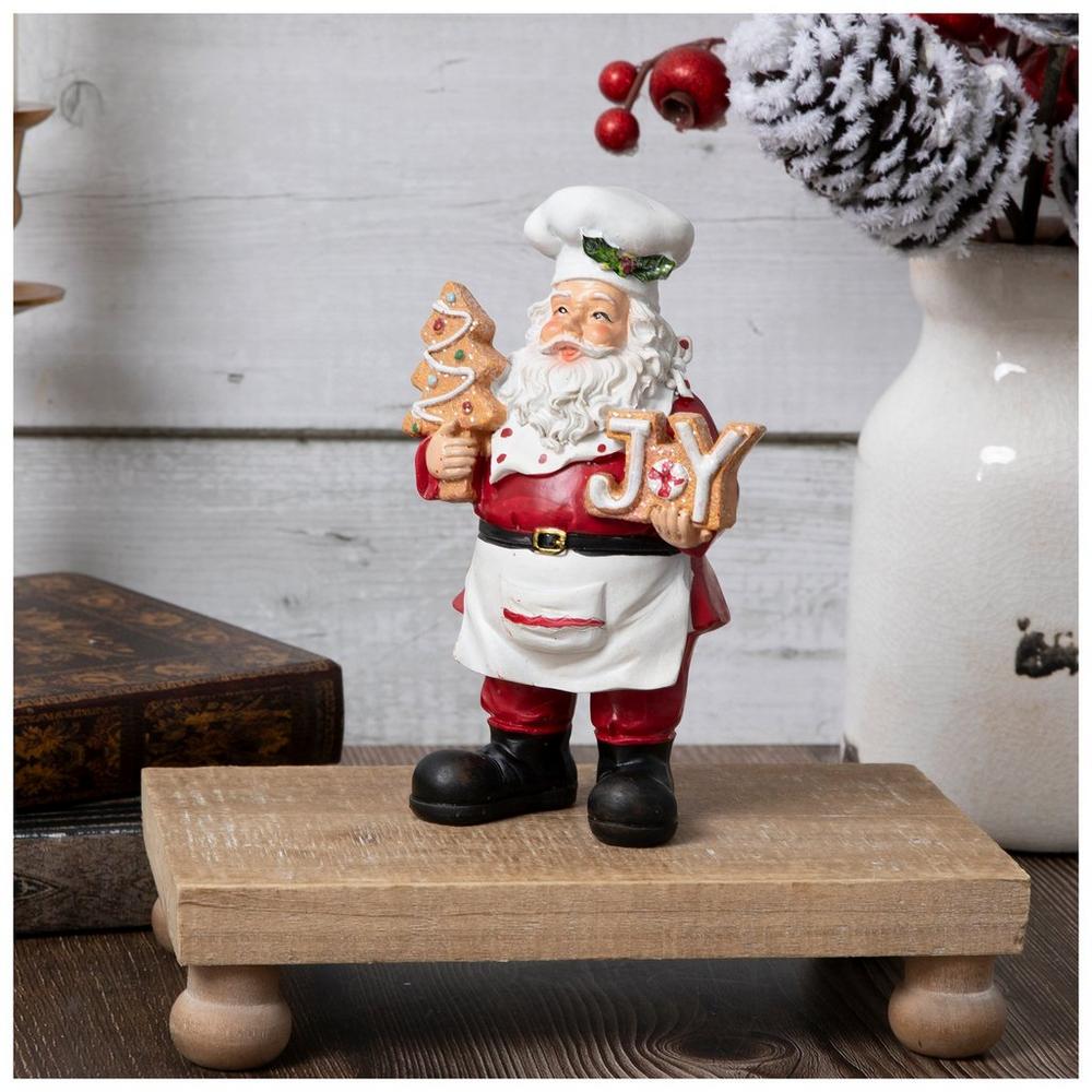 Baker Santa Holding Tree Cookie Figurine | Hobby Lobby | 205952833