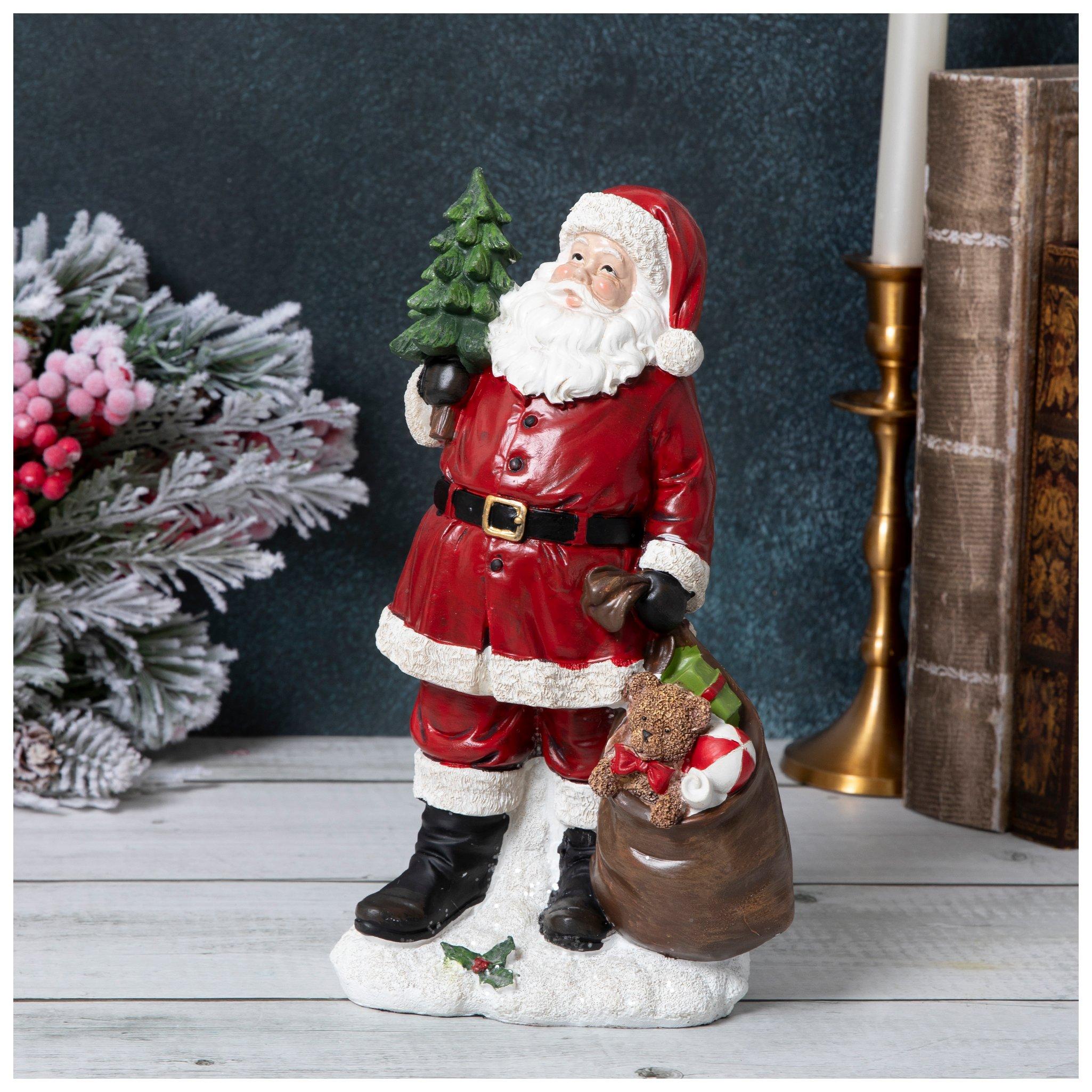 Santa Holding Christmas Tree & Gift Sack | Hobby Lobby | 205973367