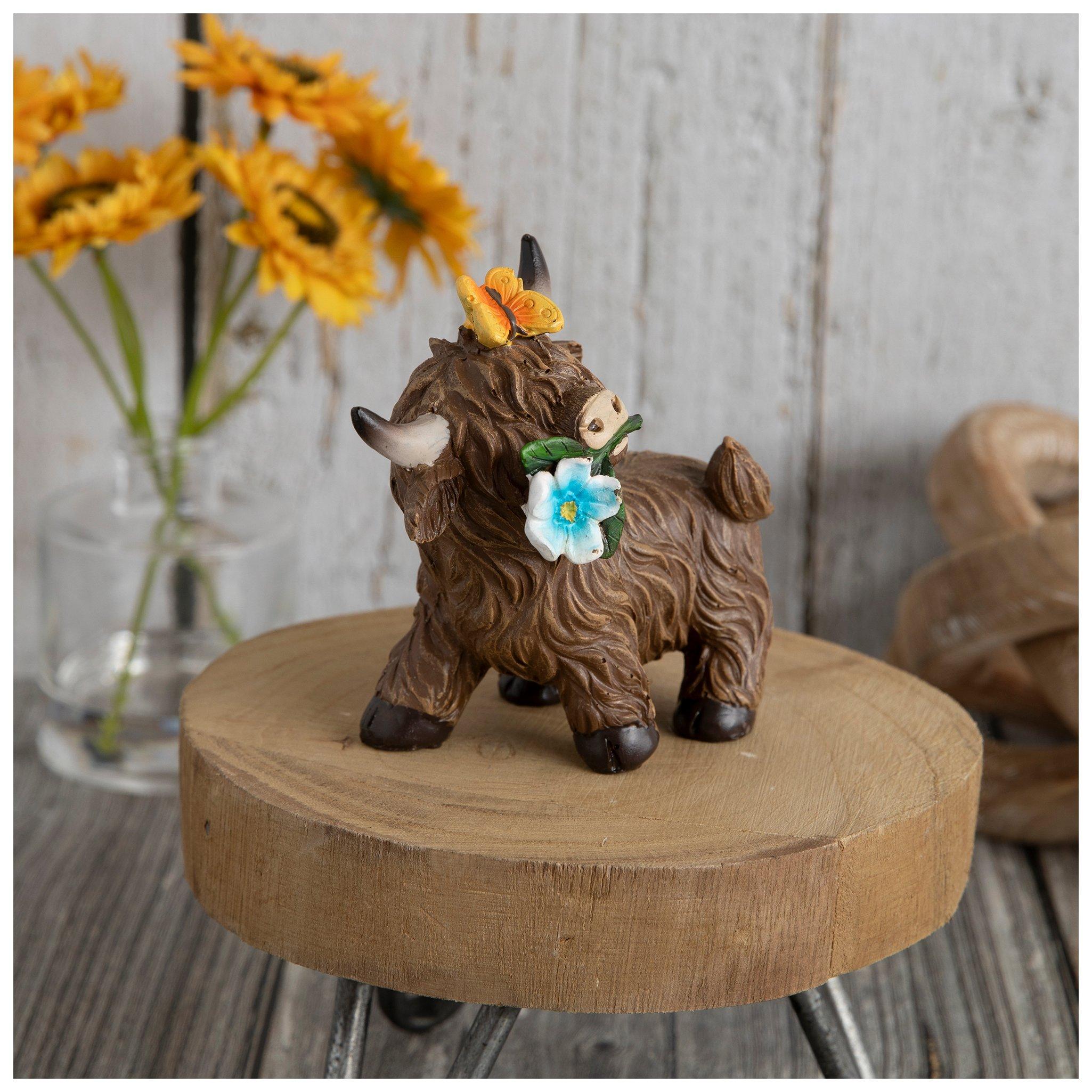 Highland Cow With Blue Flower