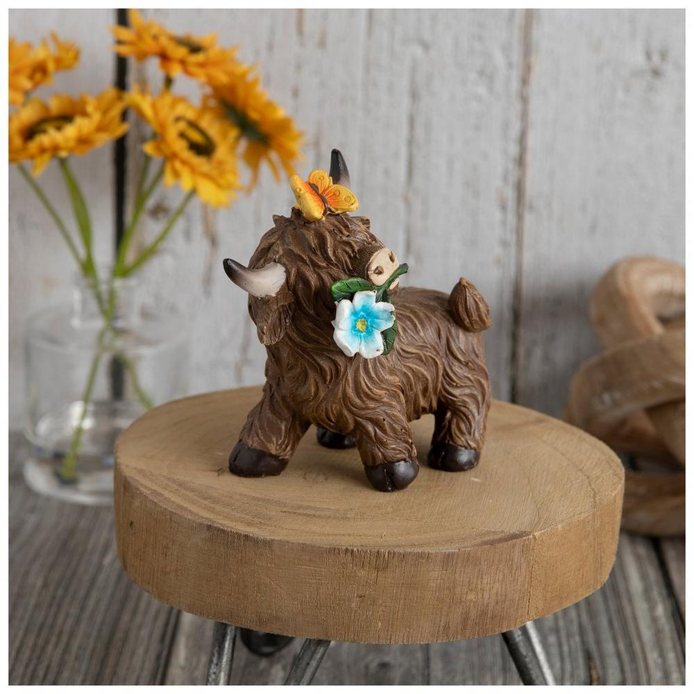 Highland Cow With Blue Flower