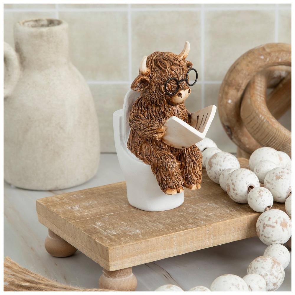 Highland Cow Sitting On Toilet Figurine