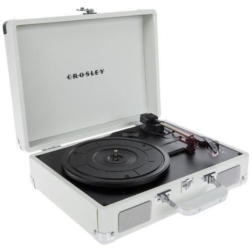 Crosley Cruiser Plus suitcase record player in white sand, lid open, showing the platter and built-in speaker grilles