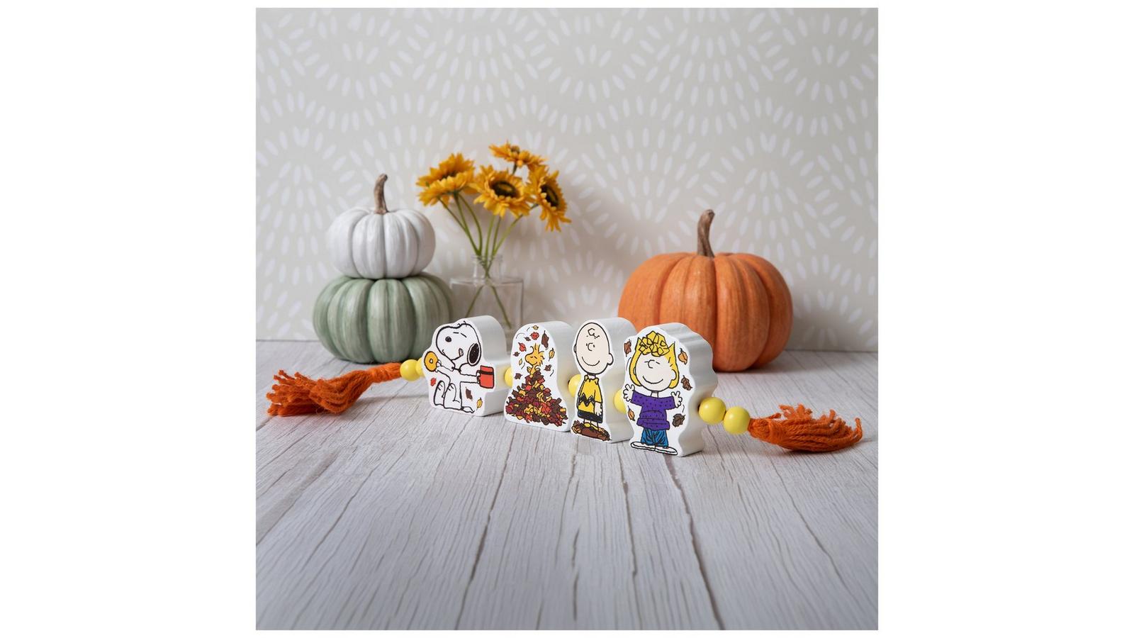 Peanuts Tassel Wood Decor | Hobby Lobby | 6412399