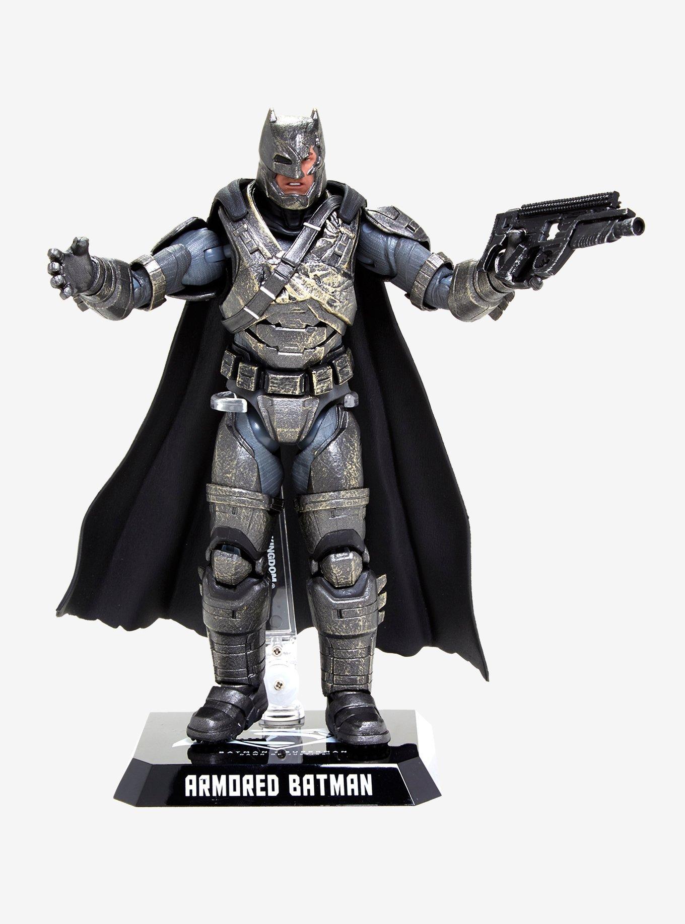 Armored batman deals battle damaged version