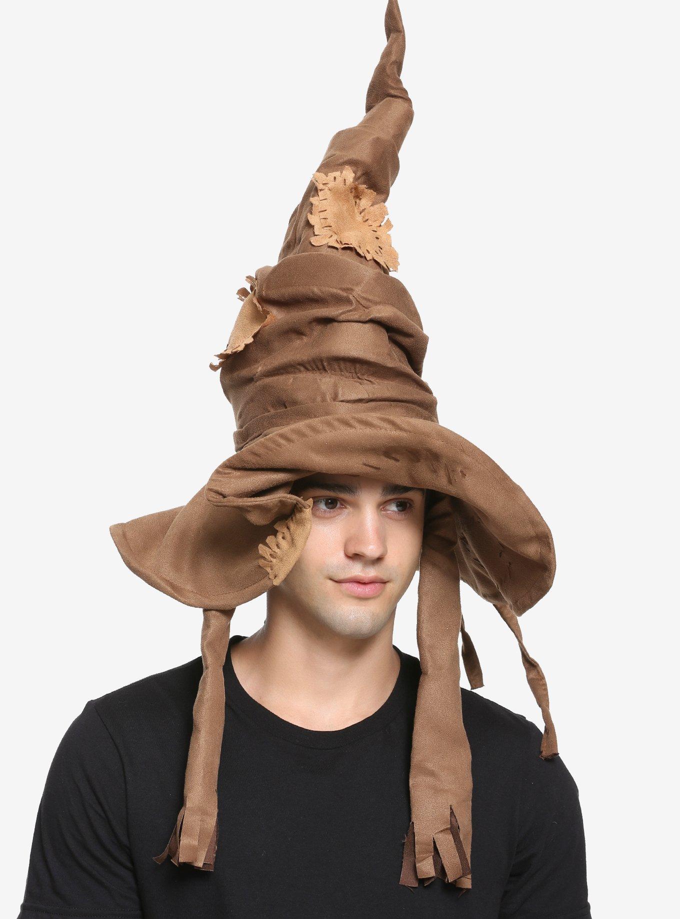 A Boy in a Harry Potter Costume Wearing the Sorting Hat · Free