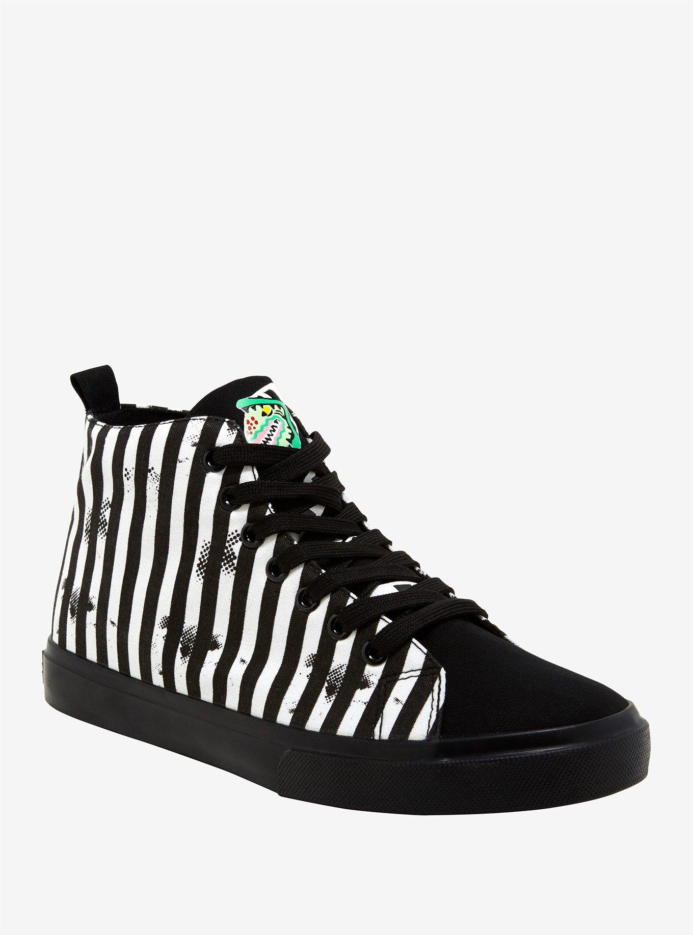 Black and store white striped shoes