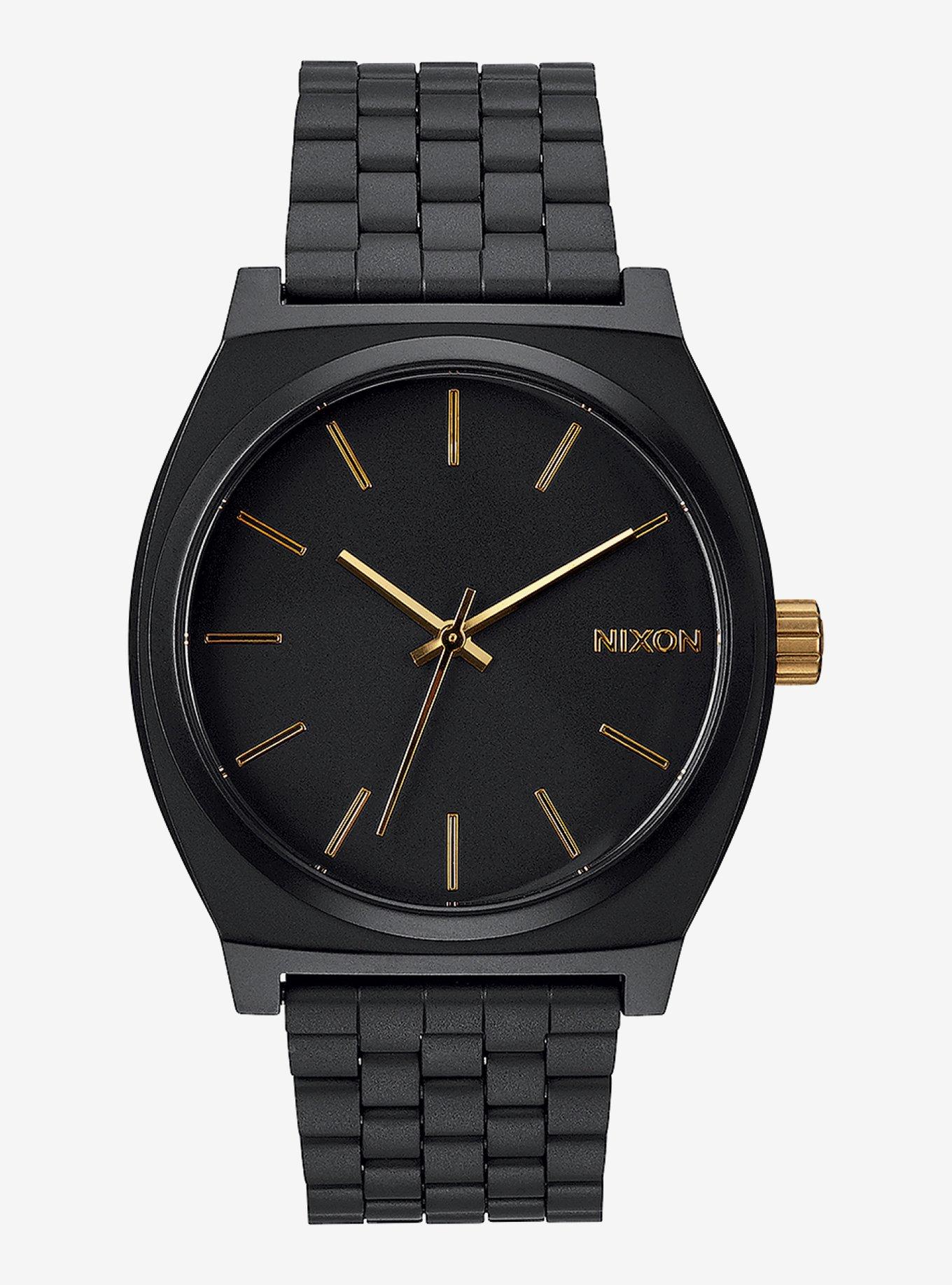 Nixon black and gold cheap watch