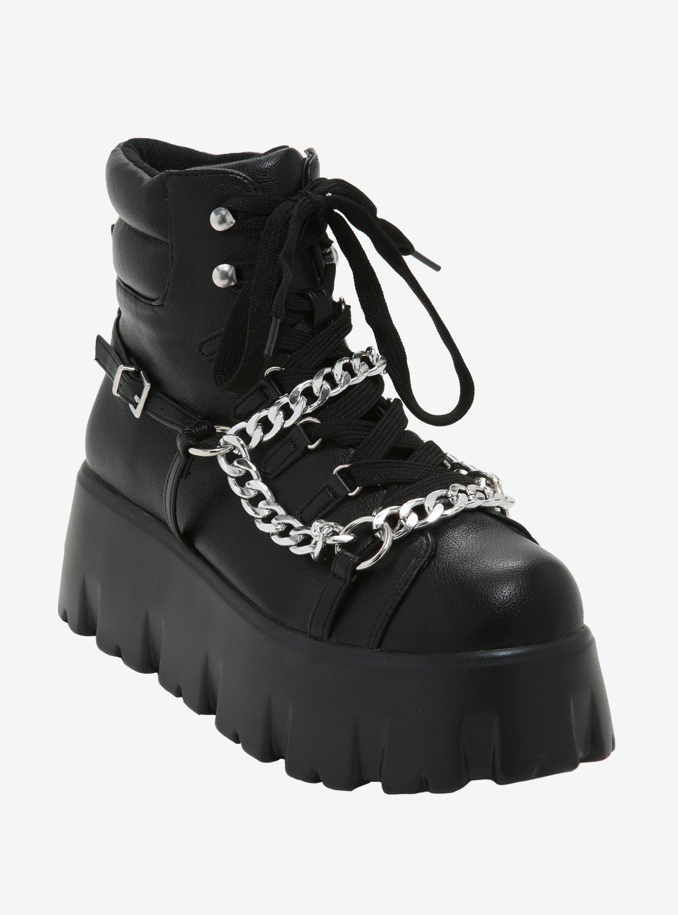 black platforms with chains
