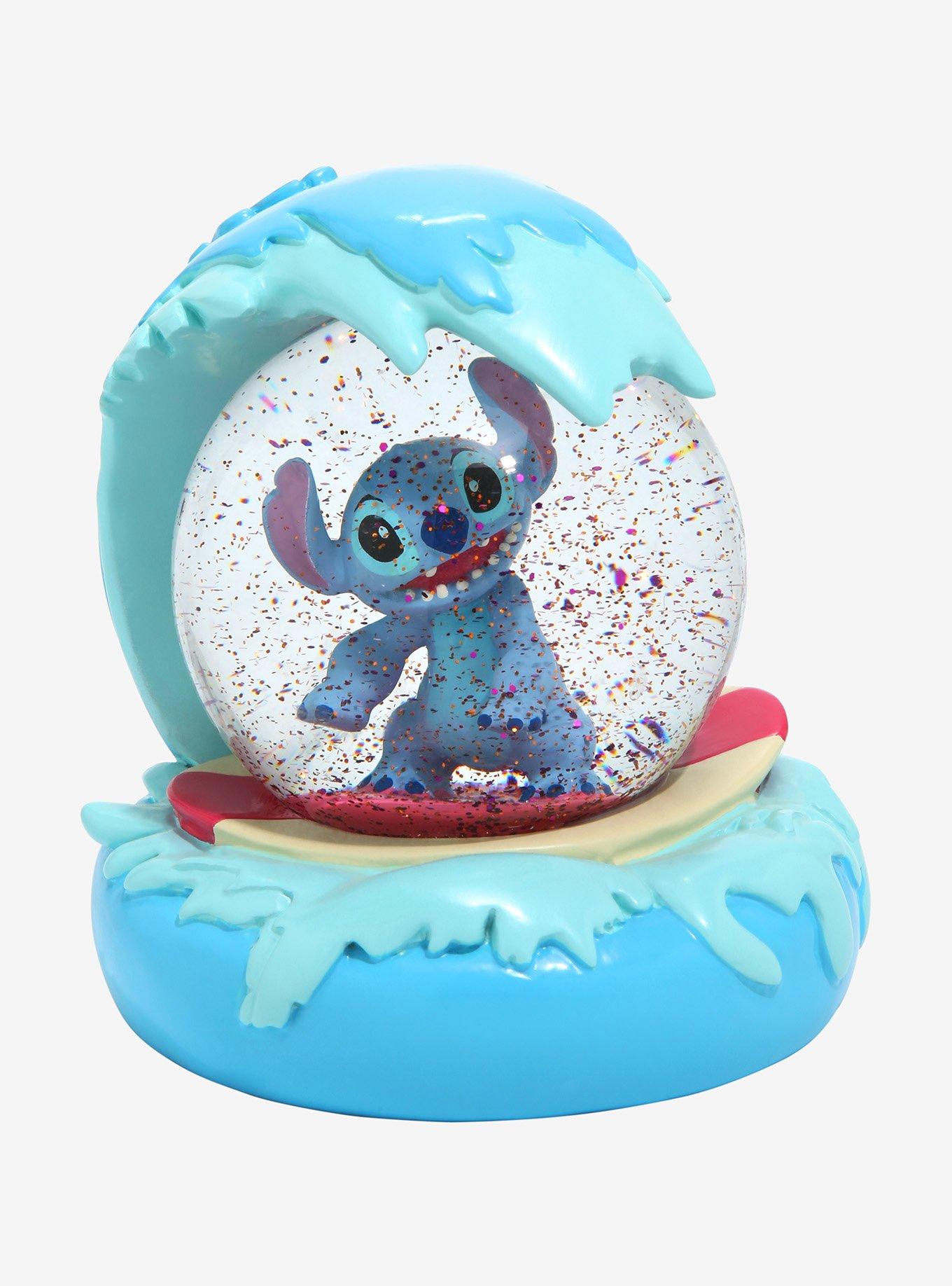 I was so happy I found a stitch snow globe 😍💙💙🎅 day made