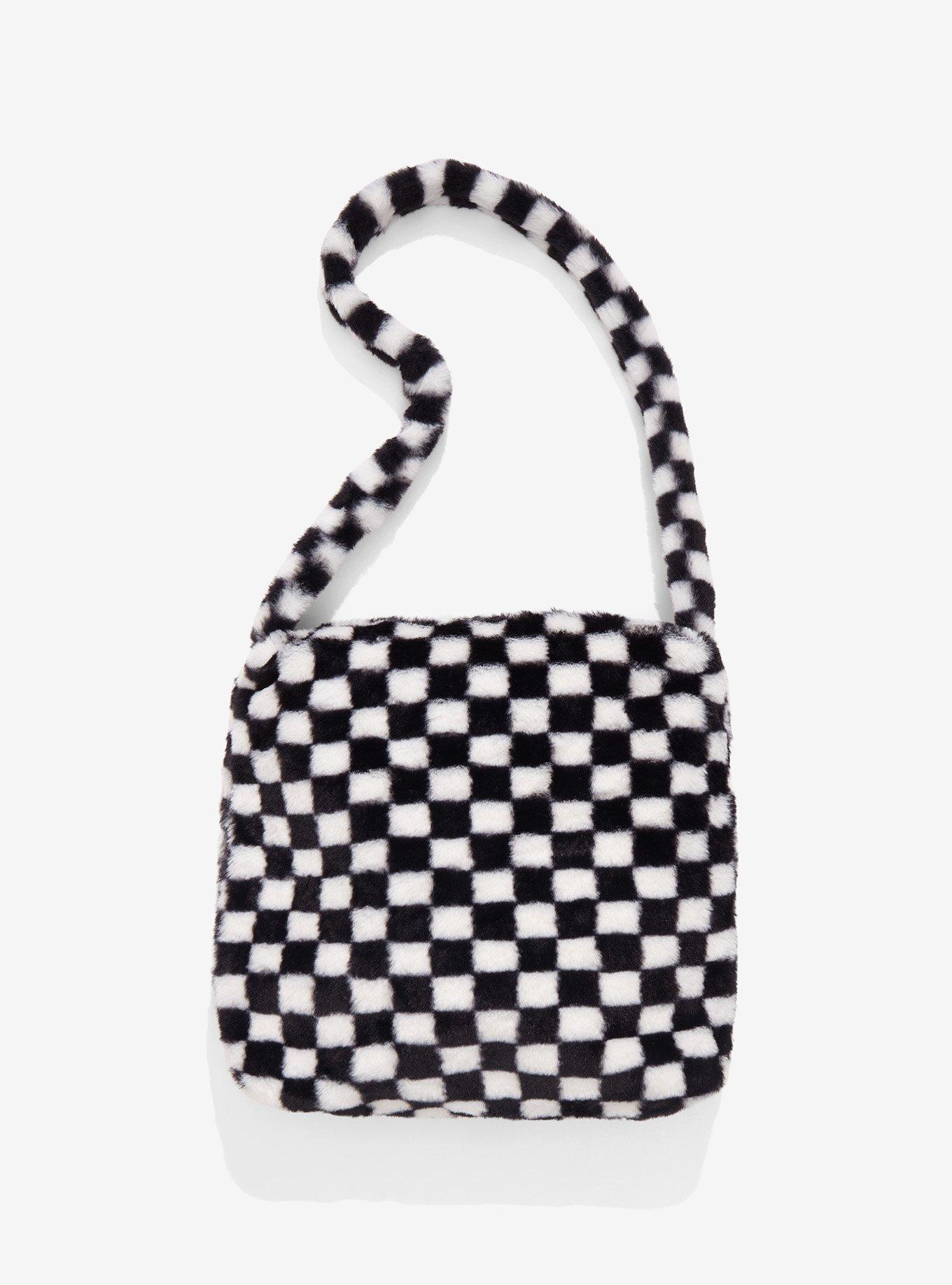 Get BLACK & WHITE STRIPES ALL PURPOSE BAG at ₹ 2199