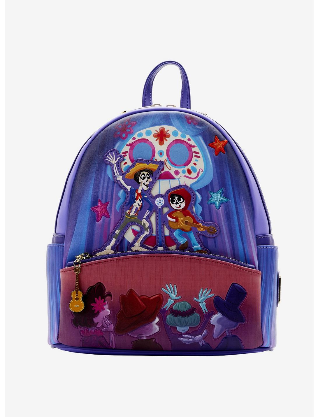 Loungefly - This Coco mini backpack is making us un poco loco! 🏵💀🏵What  part from Coco will you remember forever? You can find this beautiful gem  exclusively at  #Loungefly #Disney #Pixar #