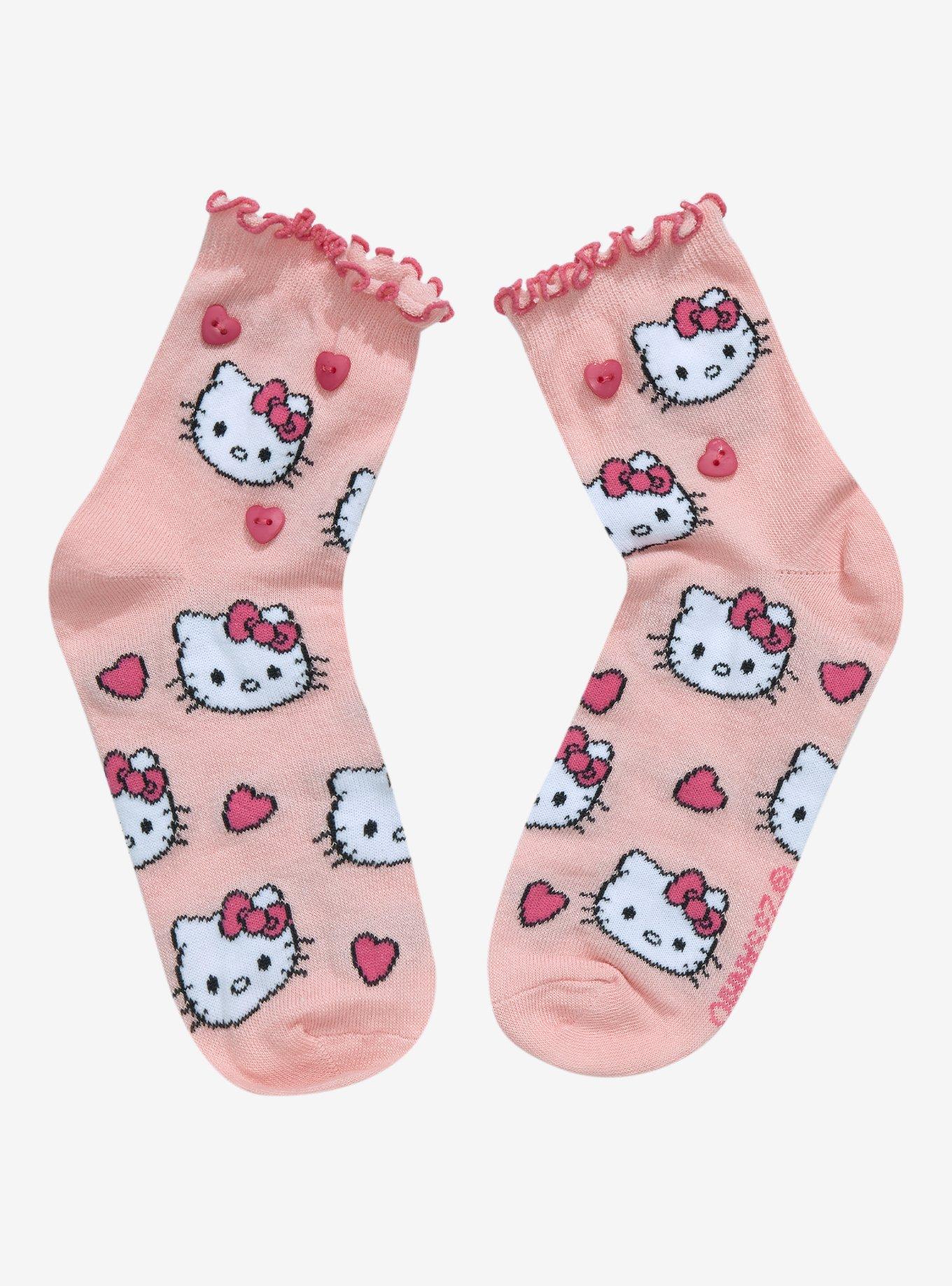 A woman in red tights and hello kitty socks photo – Free Girl